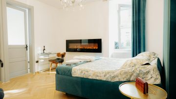 Kominek elektryczny w sypialni